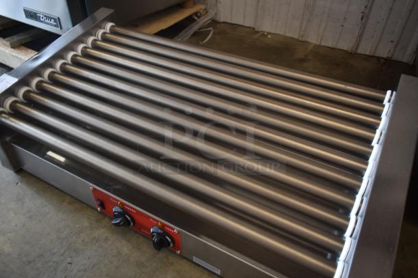 Commercial hot dog roller grill with 11 rollers, stainless steel, dual temperature controls, visible brand label, good condition.