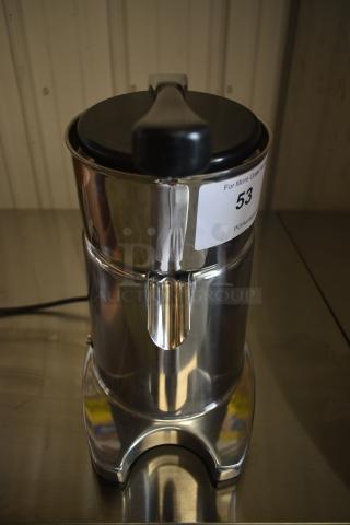 Stainless steel automatic juicer in excellent condition, with chrome finish. Marking shows lot number 53 for auction.