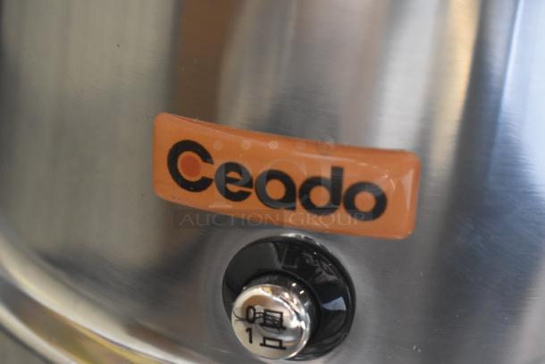 Ceado stainless steel appliance, close-up of logo and power switch, in excellent condition.