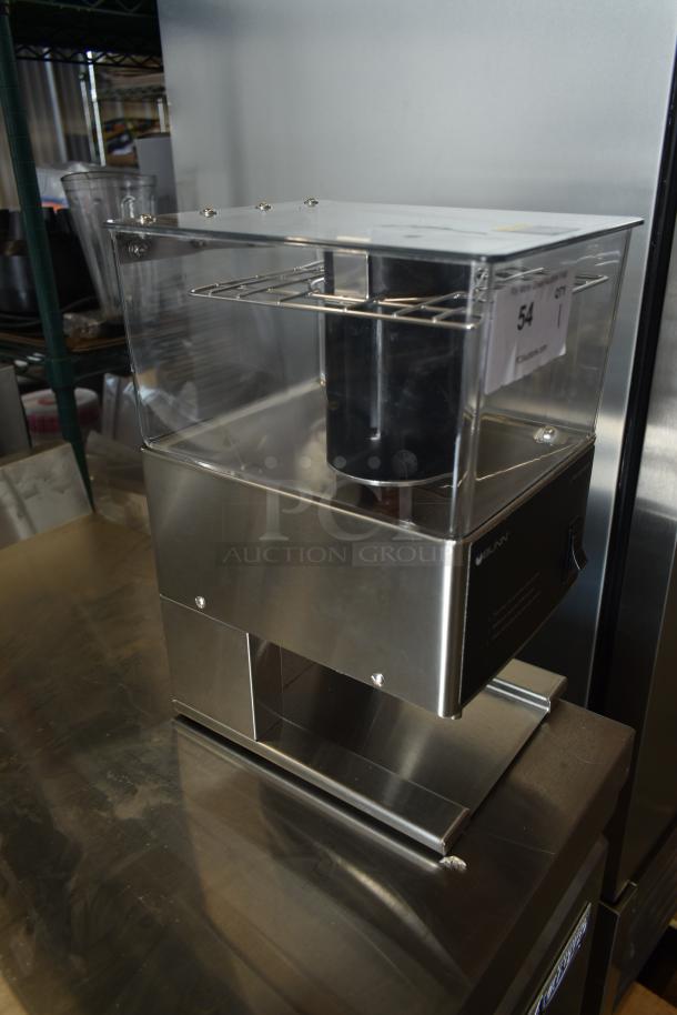Stainless steel BUNN coffee grinder, transparent top, used condition, model visible, auction tag number 54 attached.