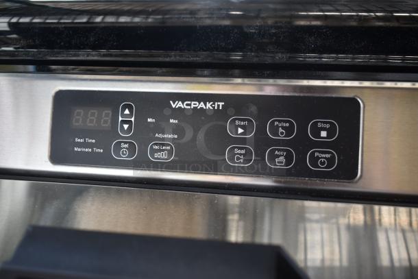 VacPak-It vacuum sealer control panel showing digital display and various function buttons. Model in good condition.