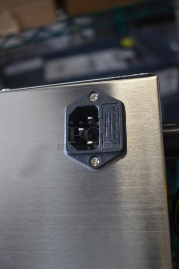 Stainless steel panel with an IEC power connector, marked "USE ONLY CLASS 3 WIRE." Mint condition, no visible wear.