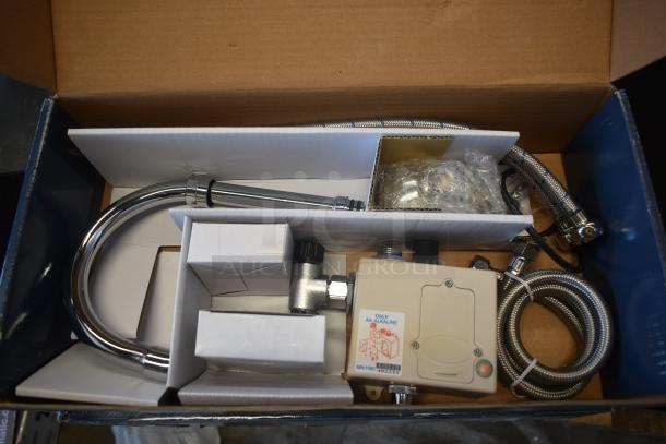 Bidet shower kit, includes chrome nozzle, control unit, flexible hose, and fittings. Unused, in original packaging. Marked "Only AA Alkaline."