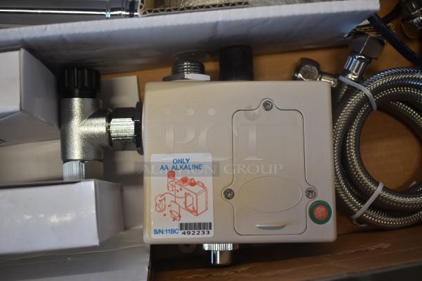 Electronic valve control with ON/OFF switch, AA alkaline battery only, serial number 11BC 492233, includes metal hose.