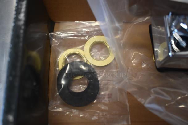 Set of washers in plastic bags, including brass and black materials, in new condition.
