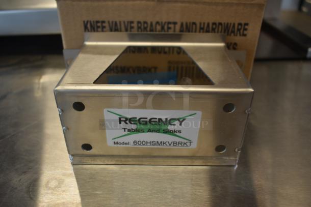 Regency stainless steel knee valve bracket, model 600HSMKVBRKT, boxed with hardware. New condition.