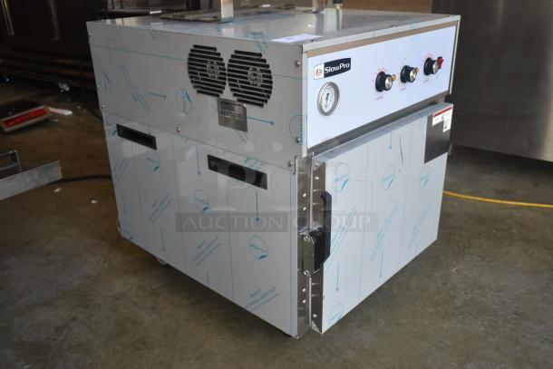 SlowPro commercial food dehydrator with control panel, temperature gauge, and protective film. Appears in excellent condition.