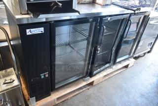 Avanco commercial refrigerator, black, three glass doors, metal shelving, in good condition, with visible brand label.