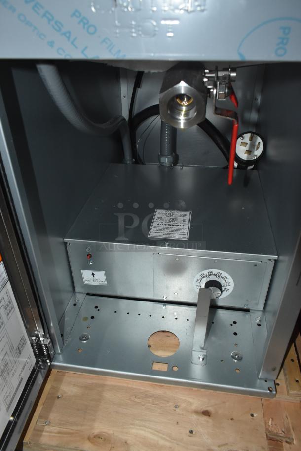 Industrial heating unit with adjustable thermostat, stainless steel construction, new condition. Warning label and release lever visible.