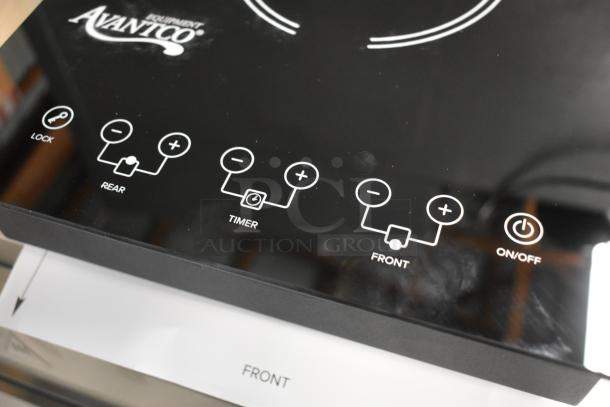 Avantco dual induction cooktop with digital controls, featuring lock, timer, and adjustable heat settings. Black glass top.