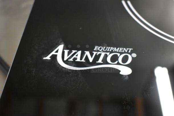 Avantco Equipment black surface with logo, in good condition, minimal wear.