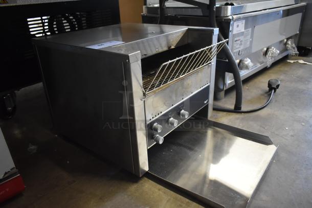 Commercial stainless steel conveyor toaster with control knobs, in good condition, marked as lot 24.