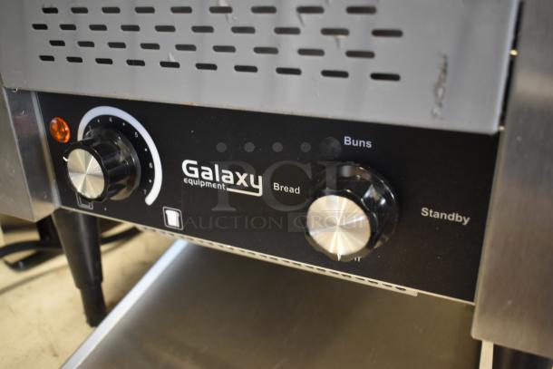 Galaxy Equipment commercial toaster with adjustable settings for bread and buns. Features stainless steel knobs in good condition.