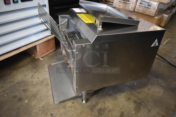 Commercial stainless steel conveyor toaster, excellent condition, with safety and operational labels visible on top panel.