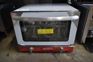 Avantco countertop convection oven, model CO-28, in used condition. Features timer, temperature controls, warning label on glass door.