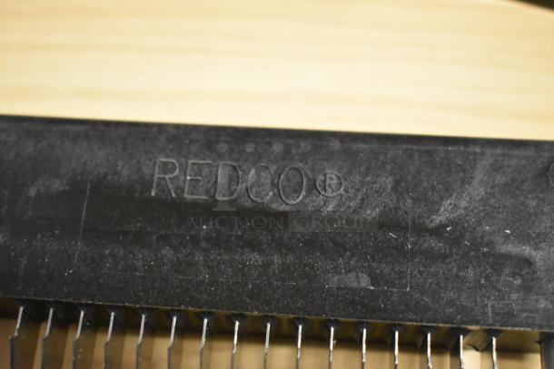 Redco slicing blade in black plastic frame, good condition, with visible Redco logo and trademark symbol.