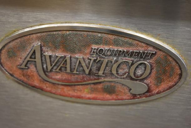 Avantco Equipment logo on a metal surface, showing signs of wear and discoloration.