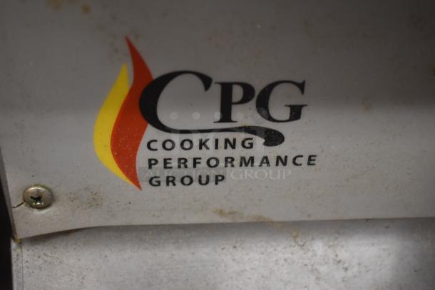 Cooking Performance Group logo on metal equipment, slight rust and wear visible, suggesting moderate use.