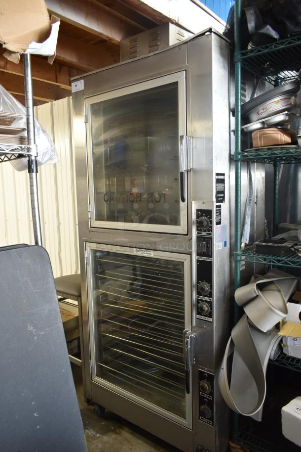Commercial stainless steel oven with dual glass doors, multiple shelves, control panel with knobs, labeled "Caution Hot."