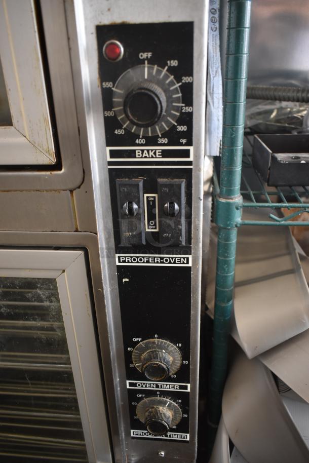 Commercial proofer-oven panel, featuring bake and proof settings with temperature and timer knobs, in used condition.