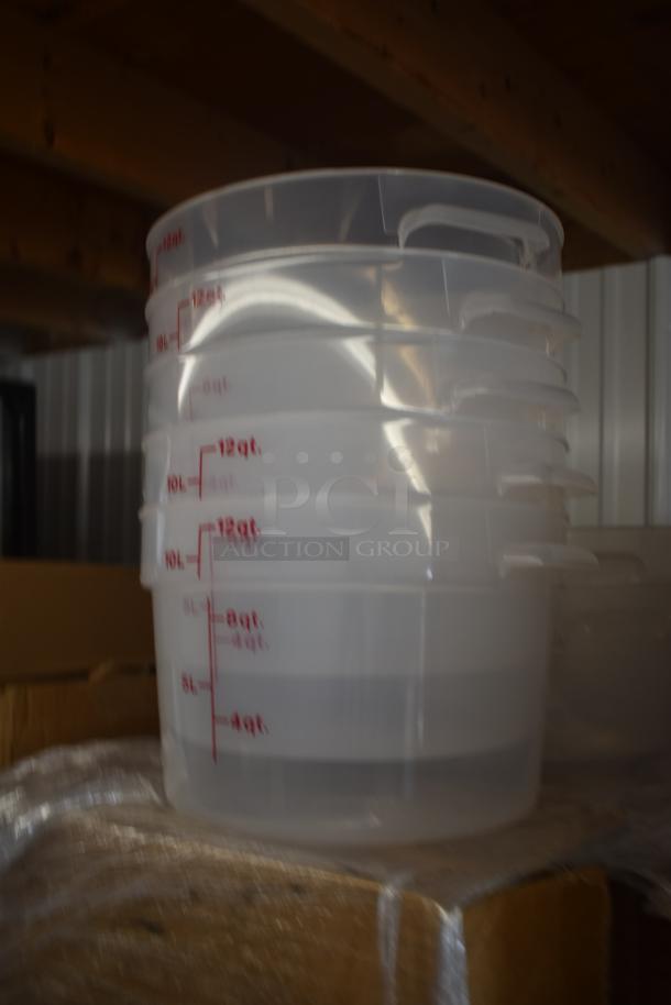 Stack of clear plastic storage containers with red measurement markings up to 12 quarts, in excellent condition.