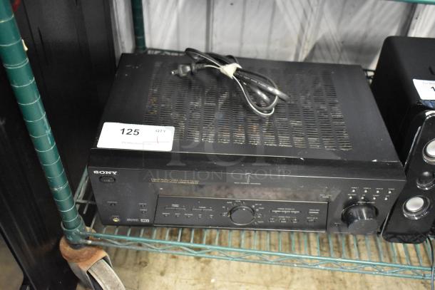 Sony audio-video control center, model with multiple input options and dials. Moderate wear, includes power cable. Auction lot 125.