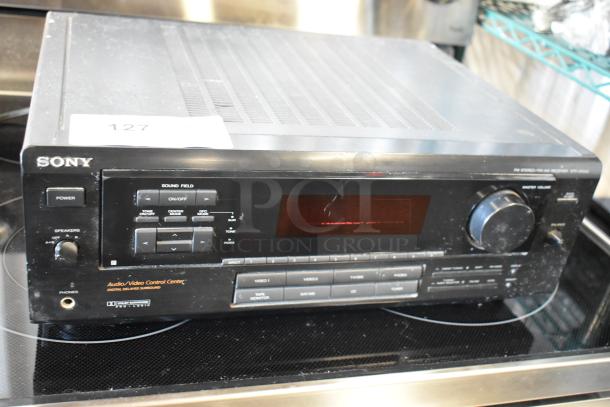 Sony FM Stereo FM-AM Receiver, STR-D990, with audio/video control center. Dusty surface, minor cosmetic wear. Label: "127."