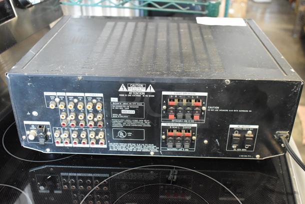 Sony STR-D550Z FM Stereo/FM-AM Receiver, multiple audio/video inputs, speaker connections, caution labels, fair condition.