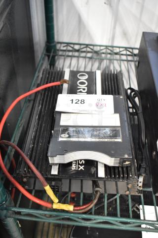 Orion car amplifier, model SX RMS, with cooling fins, shows wear. Label reads "For Home and Car Use." Auction tag 128.