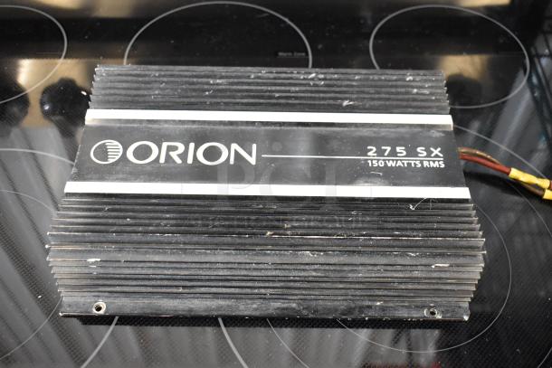 Orion 275 SX amplifier, 150 watts RMS, in used condition with visible scratches and dust.