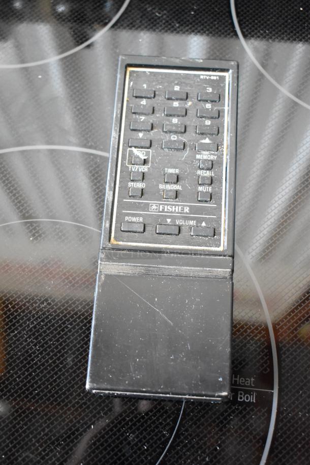 Vintage Fisher RTV-601 remote control, shows wear; features numeric keypad, TV/VCR, timer, stereo, and volume buttons.