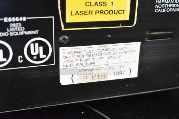 Audio equipment panel with UL certification, Class 1 laser product label, and compliance marking. Manufactured September 1997.