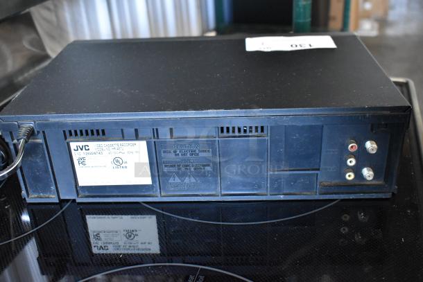 JVC VCR model HR-A51U, showing rear connections and labels indicating model, UL listed, and caution warnings.
