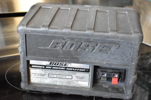 Vintage Bose Model 101 Music Monitor, serial number B31474. Black casing, visible wear, power handling 10-60W RMS, 4 ohms.