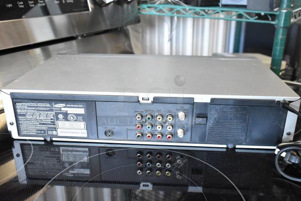 Samsung DVD/VHS Dual Deck, multiple AV inputs/outputs, model DVD-VR375, good condition, power cord attached, rear panel view.