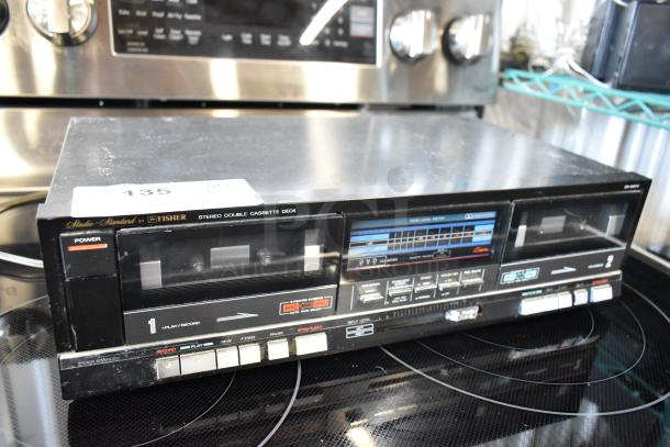 Vintage Fisher Stereo Double Cassette Deck, CR-W47, with power and function controls. Signs of wear, auction tag 135.