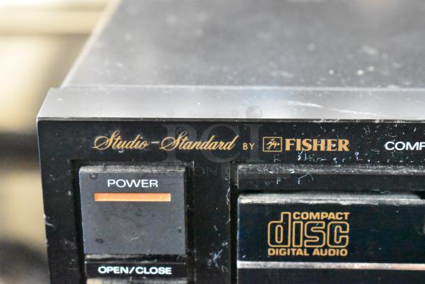 Vintage Fisher Studio-Standard CD player, black finish, visible power button, labeled "Compact Disc Digital Audio," good condition.