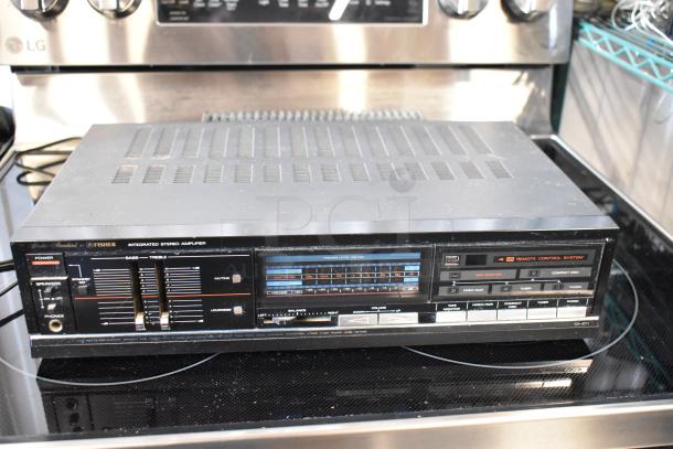 Vintage Fisher integrated stereo amplifier, model CA-871, with bass/treble controls, power level meter, in fair condition.