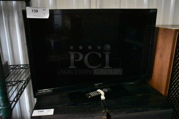 Funai LED TV with HDMI, includes remote. Auction tag indicates item 139. Good condition.
