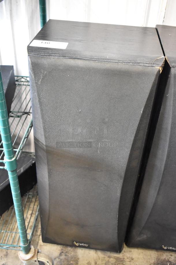 Black Infinity floor-standing speaker with fabric grille. Minor wear visible on corners. Auction tag marked "140."