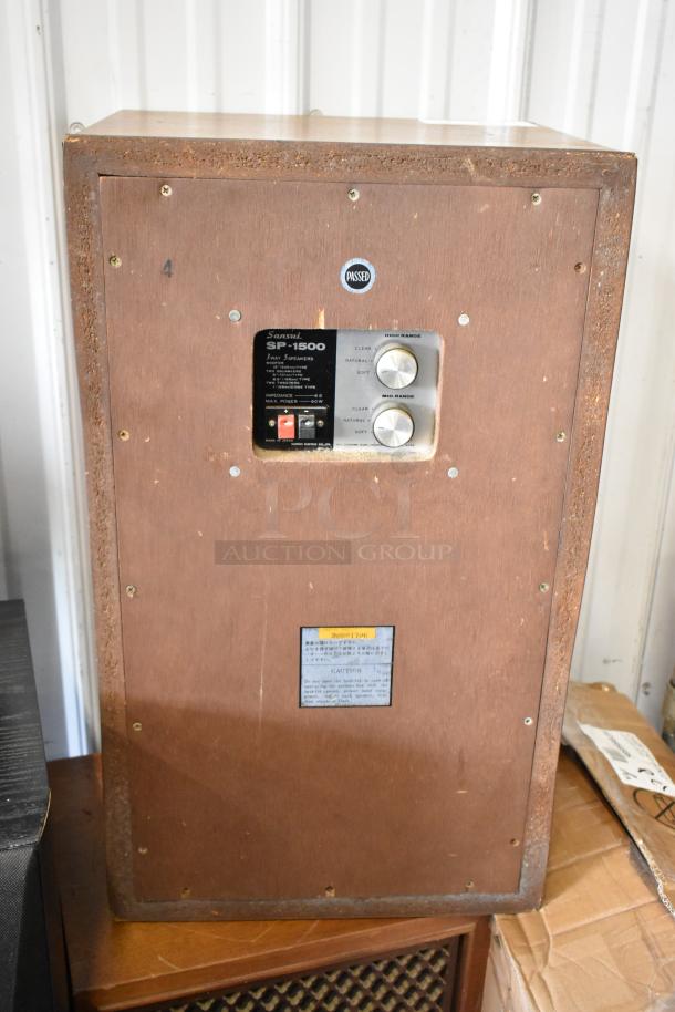 Sansui SP-1500 speaker, 3-way, vintage wood, control knobs for high/mid range, labels indicate power specs, fair condition.