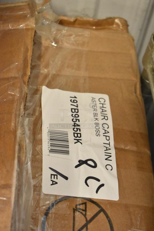 Cardboard box labeled "Chair Captain C, Aster Blk Boss," code 197B9545BK, showing signs of wear.