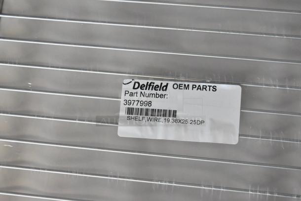 Delfield wire shelf, OEM part 3977998, dimensions 19.38x25.25, new, labeled for shelving use.