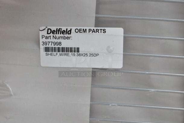 Delfield OEM wire shelf, part number 3977998, dimensions 19.38x25.25, new condition.