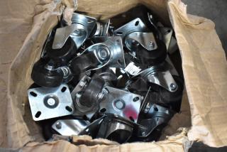 Open box of black and metal swivel casters, new condition, various quantities, suitable for industrial or furniture use.