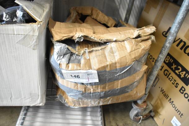 Damaged cardboard box with duct tape, labeled "146" for auction. Box shows signs of wear, tape, and tears.