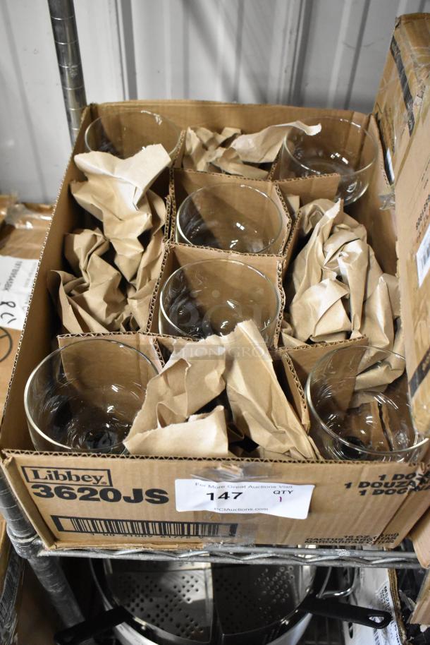 Libbey 3620JS glass tumblers in cardboard packaging, new condition, with paper padding. Quantity: 12 dozen per box.