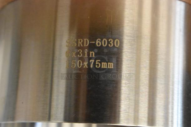 Stainless steel cylinder marked SSRD-6030, size 6x3 in, 150x75 mm, in good condition.