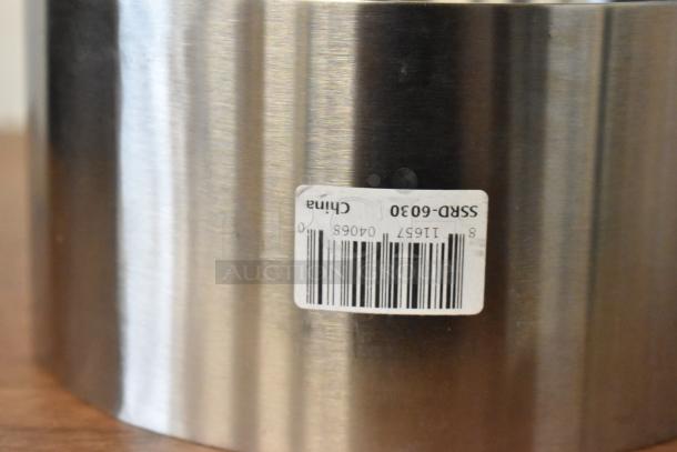 Stainless steel cylindrical object with a barcode label marked "SSR-6030, China."