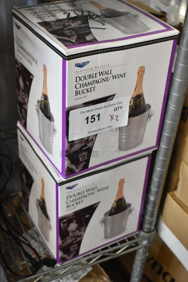 Two Vollrath double wall champagne wine buckets in boxes, stainless steel, new condition, labeled with auction info.